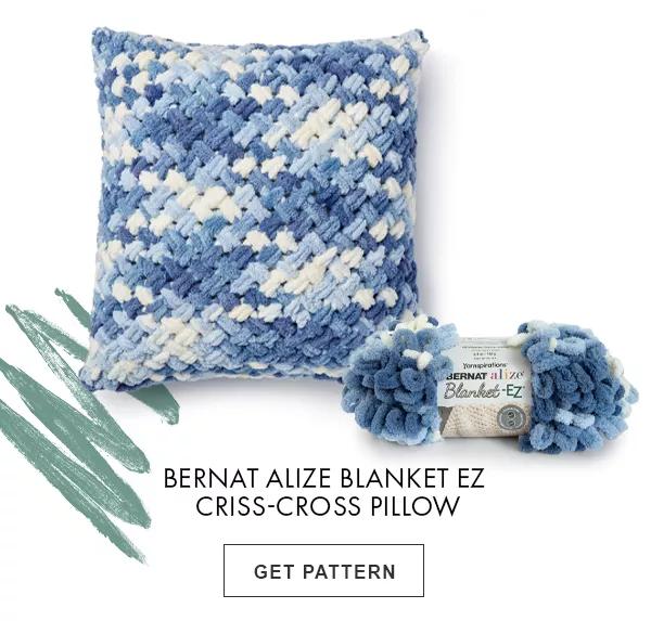 Bernat Alize Blanket-EZ Criss-Cross Pillow. GET PATTERN.